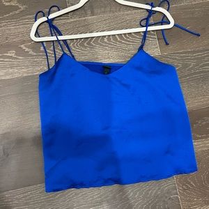 Silk blue shirt with shoulder ties